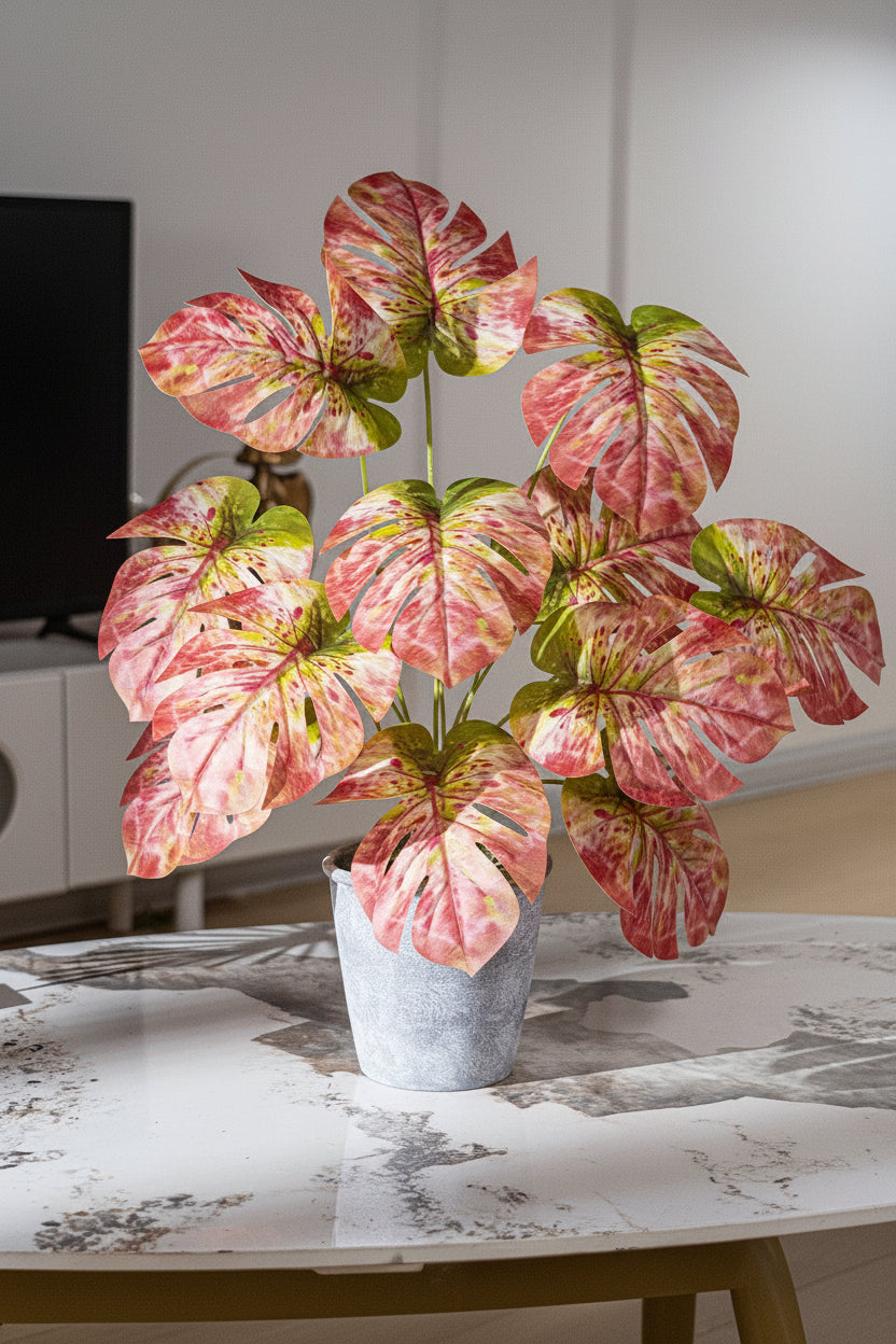 Kunstig grønn plante i potte