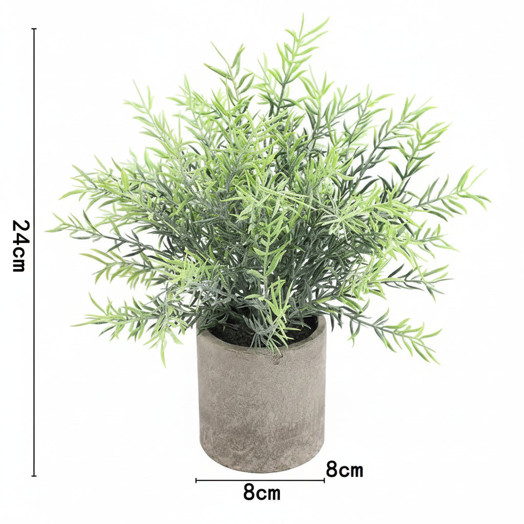 Kunstig grønn plante i dekorativ potte