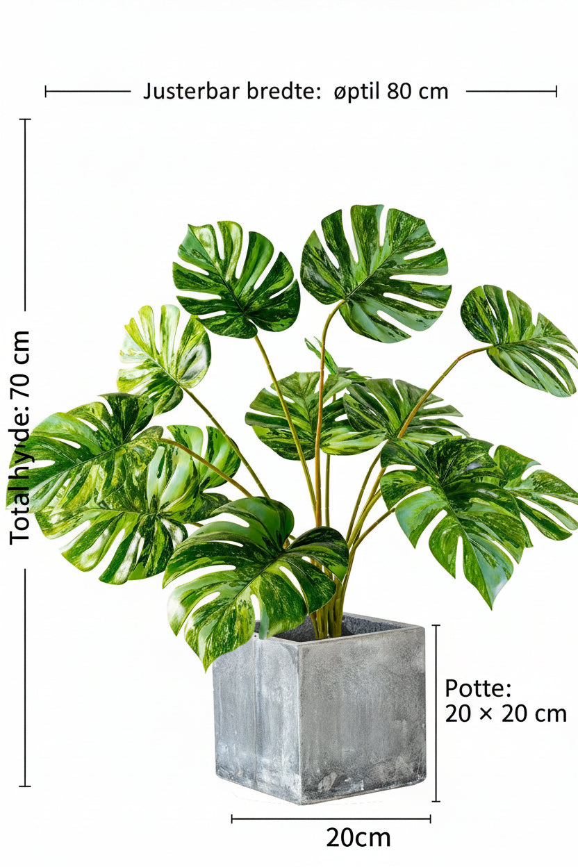 Kunstig grønn plante i potte