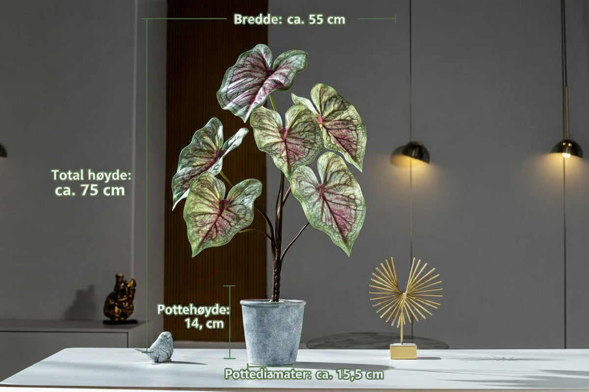 Kunstig grønn plante i potte