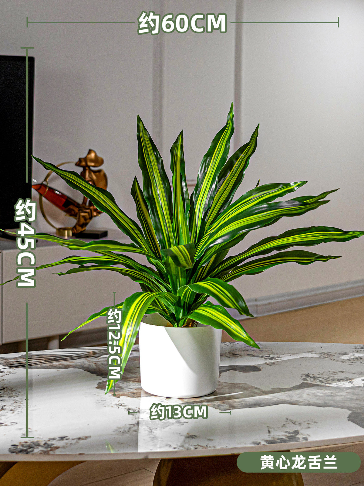 Kunstig grønn plante i potte