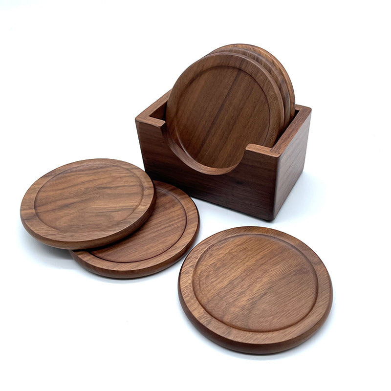 Runde trebrikker i mørkt tre med holder – 6 stk.