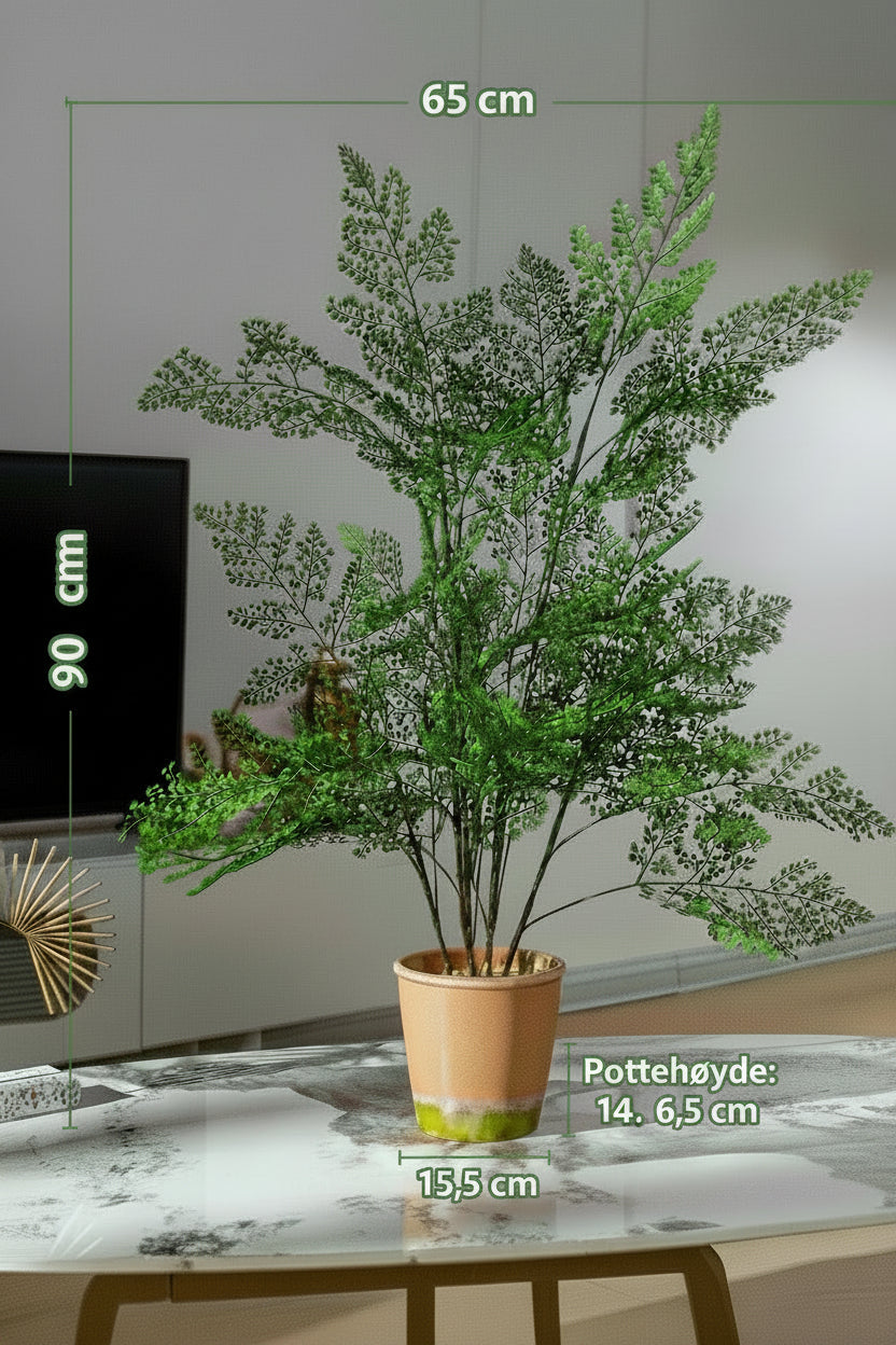 Kunstig grønn plante i potte