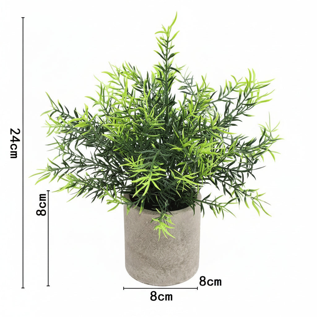 Kunstig grønn plante i dekorativ potte
